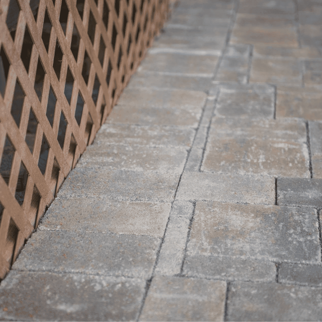 Commercial hardscape installation detail on a managed property.